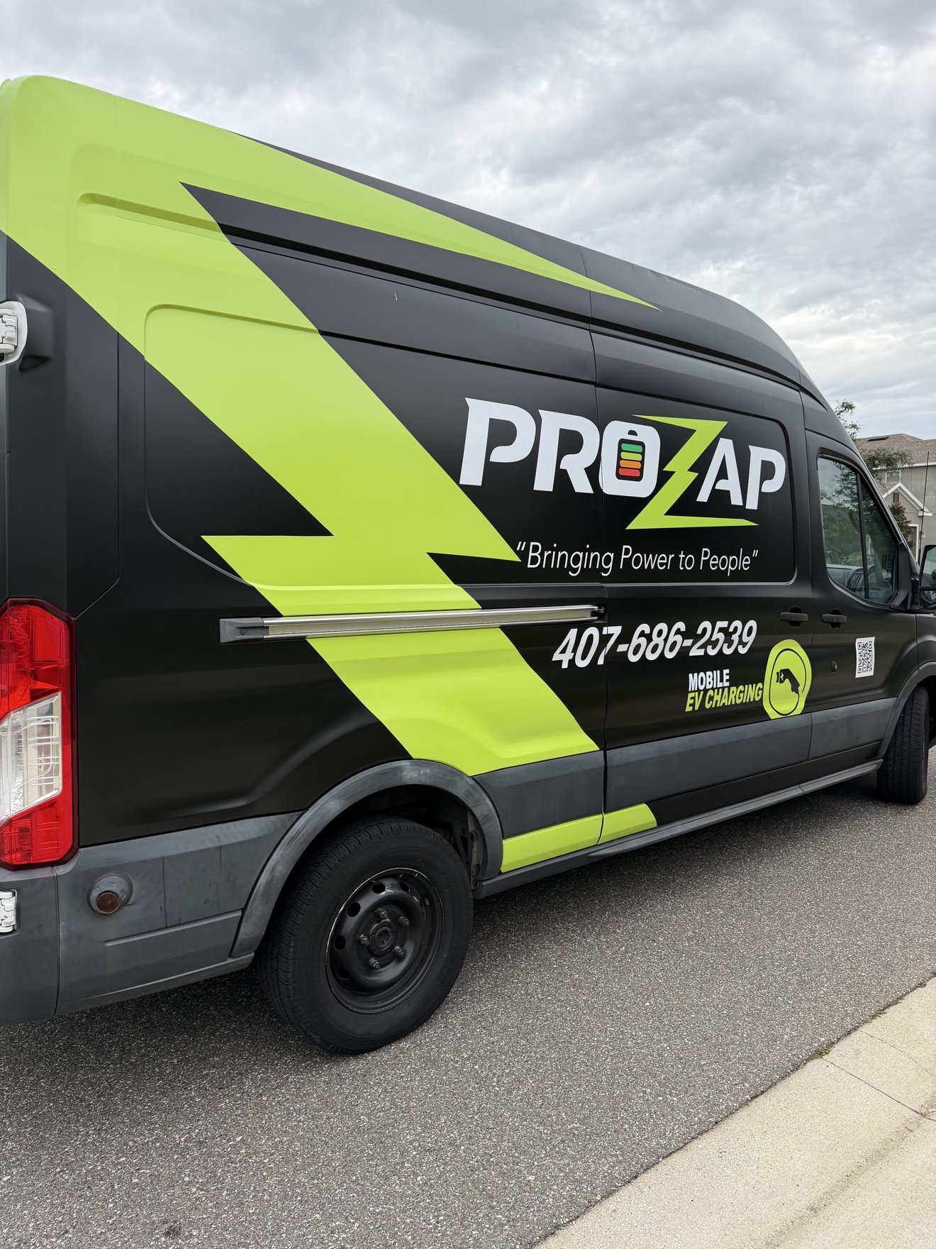 Ford Transit van with a full commercial wrap for PROZAP